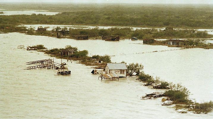 Flooding and destruction in the aftermath of the Bhola cyclone in East Pakistan is shown, Nov. 18, 1970. (AP Photo/Harry Koundakjian) |