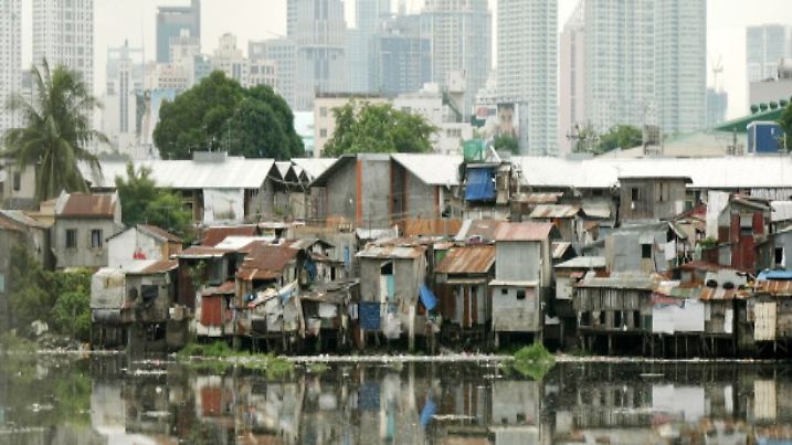 epa02814087 Rows of shanties loom over Manila's skyline seen in Pasay city, south of Manila, Philippines on 08 July 2011. The the United Nations Population Fund report ranked the Philippines as 12th most populous country in the world with an estimated population of 94 million. The report also said that the population may grow to 100 million within four years. China topped the list with 1.3 billion people, followed by India with 1.2 billion, the USA with 311 million, Indonesia with 237 million and Brazil with 190 million. EPA/FRANCIS R. MALASIG