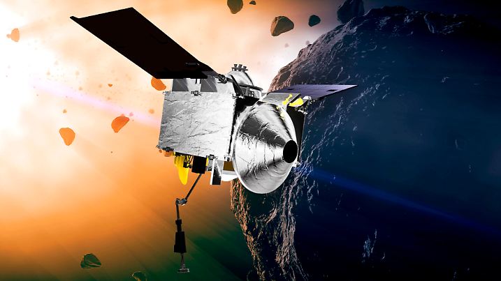 FILE - This illustration provided by NASA depicts the OSIRIS-REx spacecraft at the asteroid Bennu. On Wednesday, Aug. 11, 2021, scientists said they have a better handle on asteroid Bennu’s whereabouts for the next 200 years. The bad news is that the space rock has a slightly greater chance of clobbering Earth than previously thought. But don’t be alarmed: Scientists reported that the odds are still quite low that Bennu will hit us in the next century. (Conceptual Image Lab/Goddard Space Flight Center/NASA via AP, File)