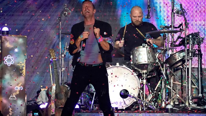 Chris Martin, left, and Will Champion, of Coldplay, perform at iHeartRadio ALTer EGO on Saturday, Jan. 15, 2022, at the Forum in Inglewood, Calif. (AP Photo/Chris Pizzello)