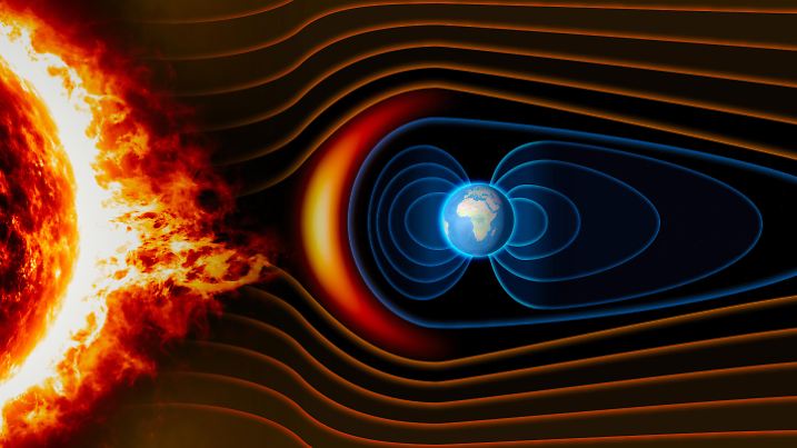 Earth's magnetic field, the Earth, the solar wind, the flow of particles. Element of this image is furnished by NASA