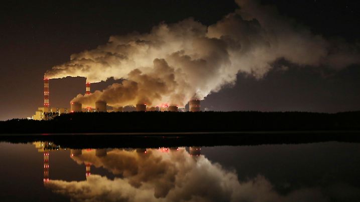 File-File photo shows clouds of smoke over Europe's largest lignite power plant in Belchatow, central Poland, on Wednesday, Nov. 28, 2018. (AP Photo/Czarek Sokolowski,file)
