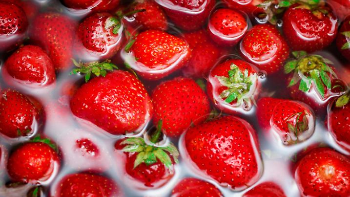Strawberries being washed with fresh water; Adobe RGB color space; see other similar images: