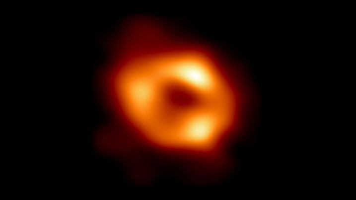 This is the first image of Sagittarius A* (or Sgr A* for short), the supermassive black hole at the center of our galaxy. It was captured by the Event Horizon Telescope (EHT), an array which linked together radio observatories across the planet to form a single "Earth-sized" virtual telescope. The new view captures light bent by the powerful gravity of the black hole, which is four million times more massive than our Sun. EHT Collaboration/National Science Foundation/Handout via REUTERS TPX IMAGES OF THE DAY