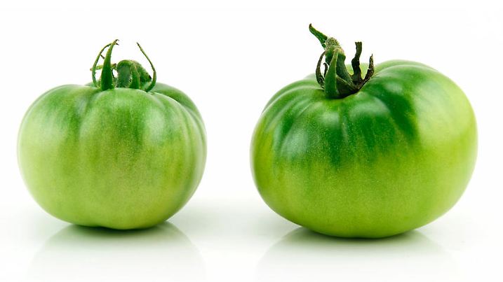 Two Ripe Green Tomatoes Isolated on White Background