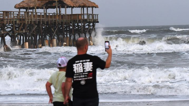  November 8, 2022, Cocoa Beach, Florida, United States: People watch the rough surf at Cocoa Beach, Florida as Tropical Storm Nicole approaches the east coast of Florida. The storm is on track to strengthen into a category 1 hurricane by Wednesday. Cocoa Beach United States - ZUMAs197 20221108_zaa_s197_223 Copyright: xPaulxHennessyx