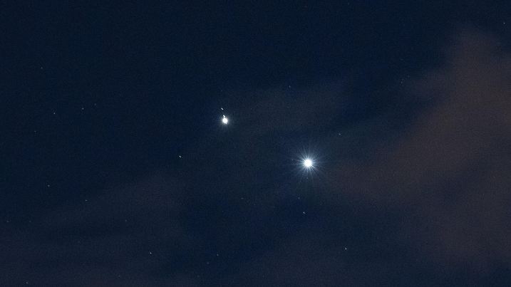Planets Jupiter and Venus in conjunction are seen after sunset above LâAquila, Italy, on march 1st, 2023. Planets seem to be very close (less than a degree away from each other). Moons (satellites) of Jupiter are visible even with a telephoto lens. (Photo by Lorenzo Di Cola/NurPhoto)