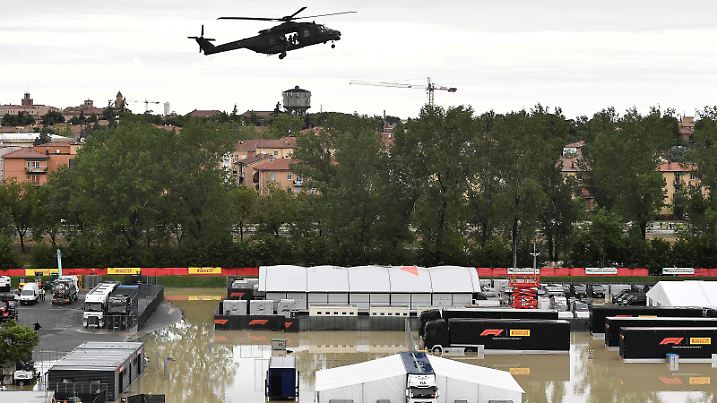 A helicopter flies above the closed Motor racing-Imola paddock, as Santerno river levels rise due to heavy rain, ahead of the weekend's cancelled Emilia Romagna Grand Prix, in Imola, Italy, May 17, 2023. REUTERS/Jennifer Lorenzini