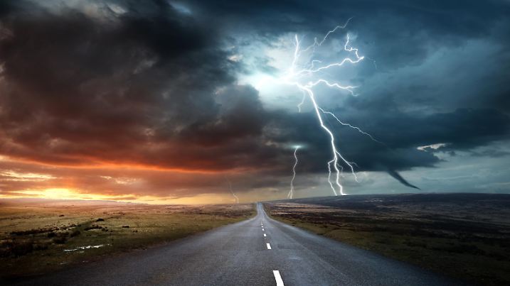 Weather forecasting and extreme conditions. A powerful storm forming late in the afternoon. Climate change photo composite.
