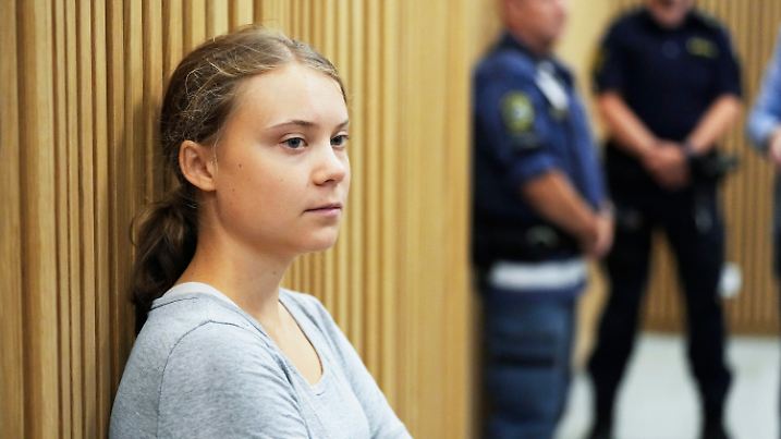 Climate activist Greta Thunberg of Sweden waits for a hearing in a court in Malmo, Sweden, Monday, July 24, 2023. Thunberg appeared in court on Monday charged with disobeying law enforcement in connection with a protest in Malmo in southern Sweden last month. (AP Photo/Pavel Golovkin)