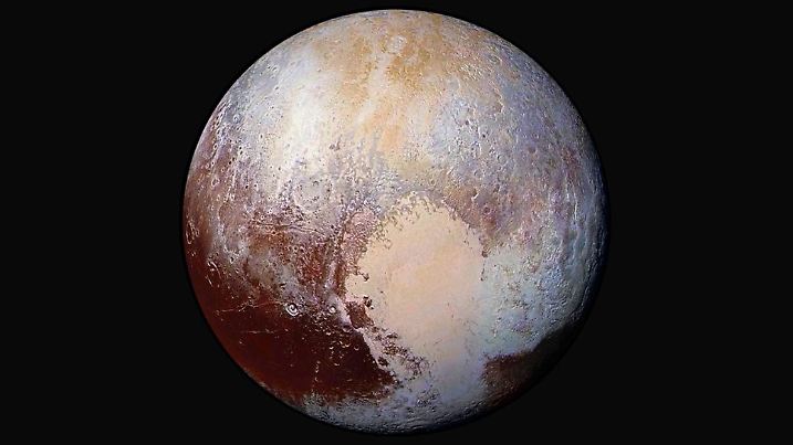 epa04859034 A handout image provided by NASA on 24 July 2015 shows the dwarf planet Pluto in enhanced color. New Horizons scientists used enhanced color images to detect differences in the composition and texture of Pluto?s surface. Four images from New Horizons? Long Range Reconnaissance Imager (LORRI) were combined with color data from the Ralph instrument to create this enhanced color global view. The images, taken when the spacecraft was 280,000 miles (450,000 kilometers) away, show features as small as 1.4 miles (2.2 kilometers). EPA/NASA / HANDOUT Image Credit: NASA/JHUAPL/SwRI HANDOUT EDITORIAL USE ONLY +++(c) dpa - Bildfunk+++