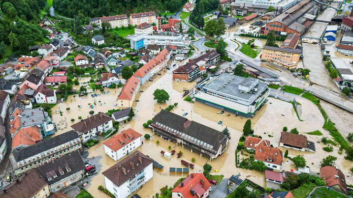 A flooded area is seen in Ravne na Koroskem, some 60 km (38 miles) northeast of Ljubljana, Slovenia, Friday, Aug. 4, 2023. Heavy rains caused flash floods and landslides in parts of Slovenia, blocking roads and bridges, flooding buildings and forcing evacuations on Friday. Slovenia's environmental agency, ARSO, raised the weather alert to the highest level after a month's amount of rain fell within 24 hours in northern, northwestern and central parts of the country. (AP Photo/Gregor Ravnjak)