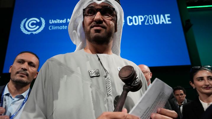 COP28 President Sultan al-Jaber holds the gavel at the end of the COP28 U.N. Climate Summit, Wednesday, Dec. 13, 2023, in Dubai, United Arab Emirates. (AP Photo/Peter Dejong)