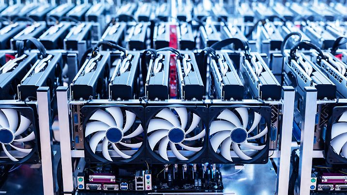 Bitcoin mining farm. IT hardware. Electronic devices with fans. Cryptocurrency miners.