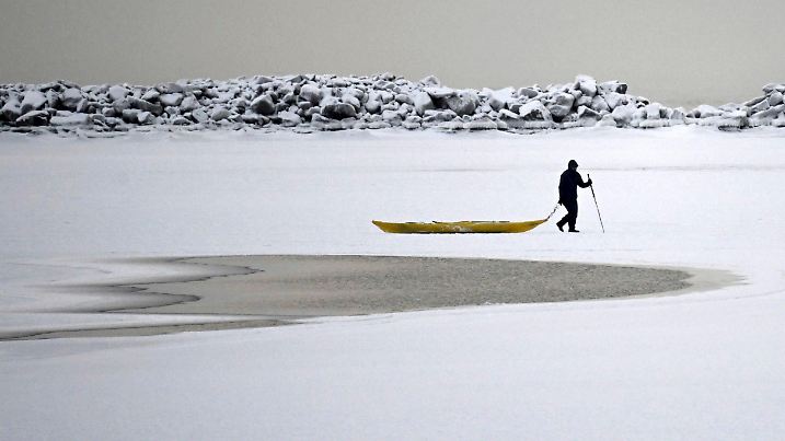 A man walks on the frozen sea in southern Helsinki, Finland, Tuesday, Jan. 2, 2024. Finland and Sweden have recorded this winter’s cold records on Tuesday as a temperatures plummeted to over minus 40 degrees as a result of a cold spell prevailing in the Nordic region. (Vesa Moilanen/Lehtikuva via AP)