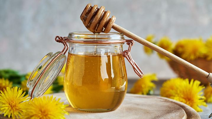 Dandelion honey made from fresh flowers collected in spring