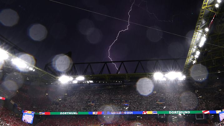 DORTMUND, GERMANY - JUNE 29: General view inside the stadium as a lightening is seen during the UEFA EURO 2024 round of 16 match between Germany and Denmark at Football Stadium Dortmund on June 29, 2024 in Dortmund, Germany. (Photo by Alexander Hassenstein/Getty Images)