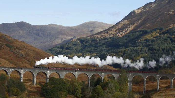 The Jacobite steam train LMS Stanier Class 5 4-6-0 45407 'The Lancashire Fusilier' just after departing Glenfinnan station on route to Mallaig. This journey has been made famous in The Hogwarts Express in the Harry Potter films....... |