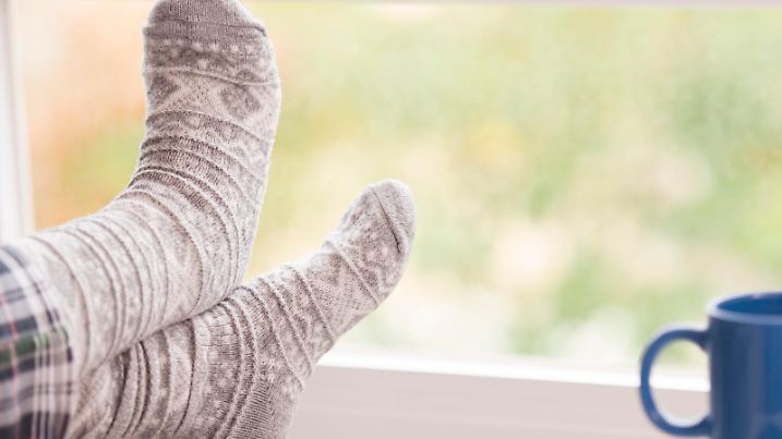 legs on radiator at winter season
