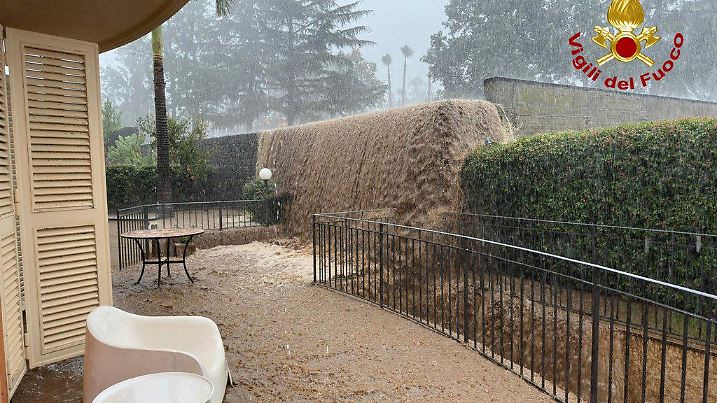 In this image released on Wednesday, Nov. 13, 2024, by the Italian firefighters water floods a building near Catania, Sicily following torrential rains that made a river overflow. (AP Photo/Vigili del Fuoco, HOGP)