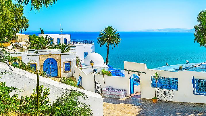 The view on the best restaurant in town with the bright blue sea on the background, Sidi Bou Said, Tunisia