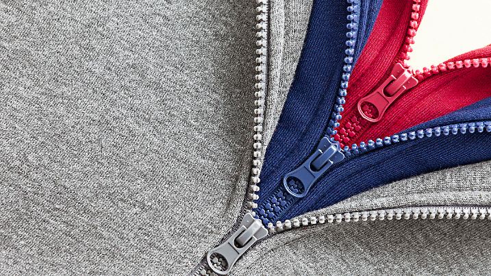 Three layers of sweaters in different colors