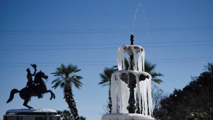 Ice covers a fountain in Jackson Square after a rare winter snowstorm churned across the U.S. Gulf Coast, in New Orleans, Louisiana, U.S. January 22, 2025. REUTERS/Shawn Fink