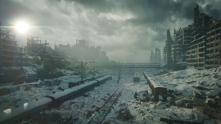 The cold winter sun rises over a desolate urban landscape, casting a soft light on the snow-covered ruins. Derelict apartment buildings line the horizon while frozen railways and scattered debris tell a story of abandonment.