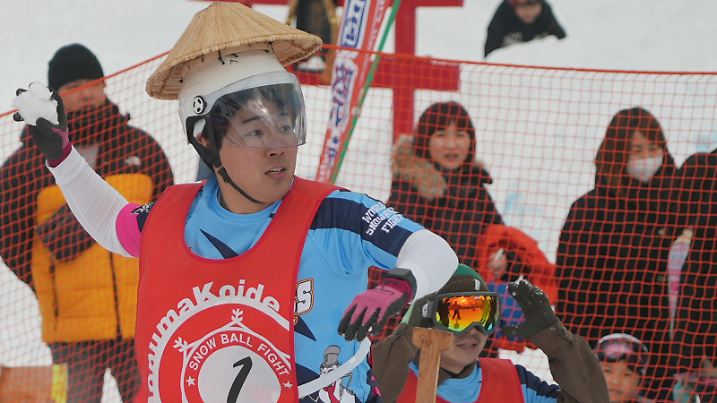 A man throws a snowball at the 35th Koide International Snowball Fight in Uonuma, Niigata Prefecture, Japan, February 9, 2025.  REUTERS/Tom Bateman
