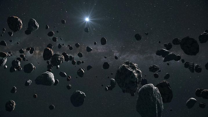 View of Asteroids circling around the sun in the Solar System
