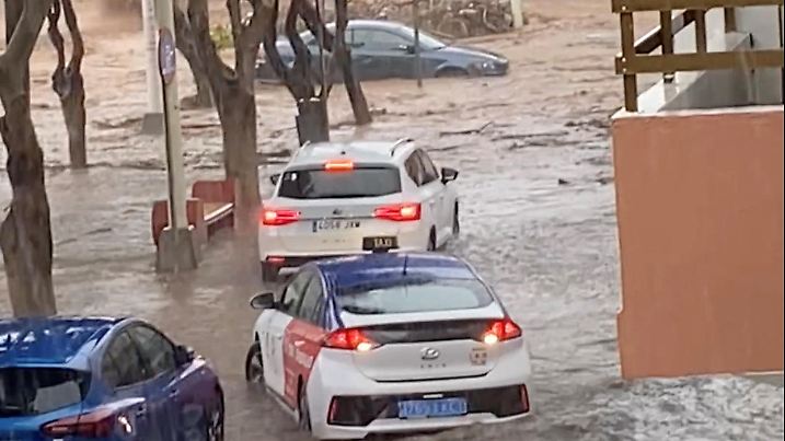 A partially submerged car remains stuck following flash floods in Telde, Gran Canaria, Spain, March 3, 2025, in this screengrab from a video obtained from social media. LILY ASH/via REUTERS  THIS IMAGE HAS BEEN SUPPLIED BY A THIRD PARTY. MANDATORY CREDIT. NO RESALES. NO ARCHIVES.