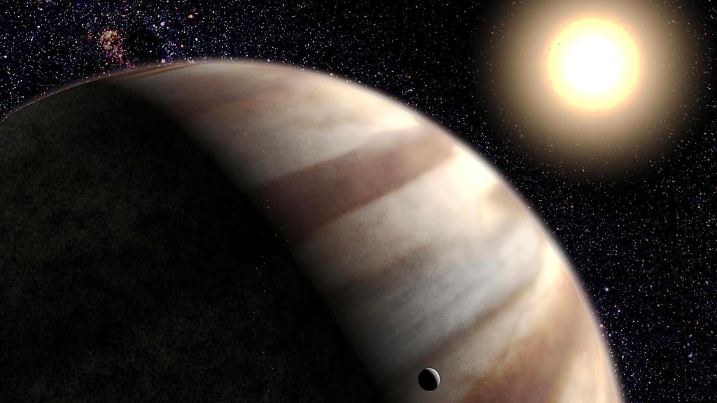 Amerikanische Astronomen haben erstmals bei einem Planeten (l) außerhalb unseres Sonnensystems eine Atmosphäre nachgewiesen. Wie die US-Raumfahrtbehörde NASA am 27.11.2001 bekannt gab, ist der um den Stern «HD 209458» (r) kreisende Planet 150 Lichtjahre von der Erde entfernt (NASA-Zeichnung vom 27.11.2001). Die Atmosphäre war mit Hilfe des Hubble-Weltraumteleskops zu erkennen, als der Planet genau seine Sonne verdeckte. Erstmals konnten Astronomen damit sehen, wie das Licht der entfernten Sonne durch die Atmosphäre des Planeten gefiltert wurde. Zugleich zeigte eine Hubble- Spektralanalyse Spuren von Natrium in der Atmosphäre. Der Planet war 1999 entdeckt worden. Er ist etwa zwei Drittel so groß wie der Jupiter und ist nach Einschätzungen der Wissenschaftler gasförmig.