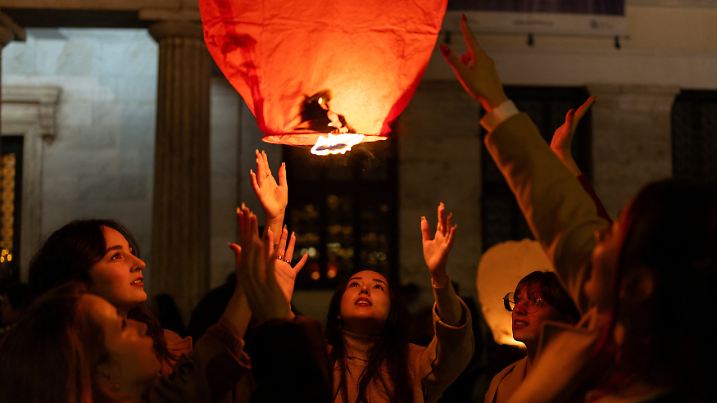 People release sky lanterns during Christmas festivities in Athens