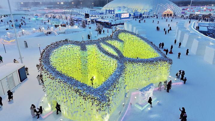 HARBIN, CHINA - JANUARY 02: Aerial view of the icefall adorned with roses and crowned by a heart-shaped ceiling at the 2