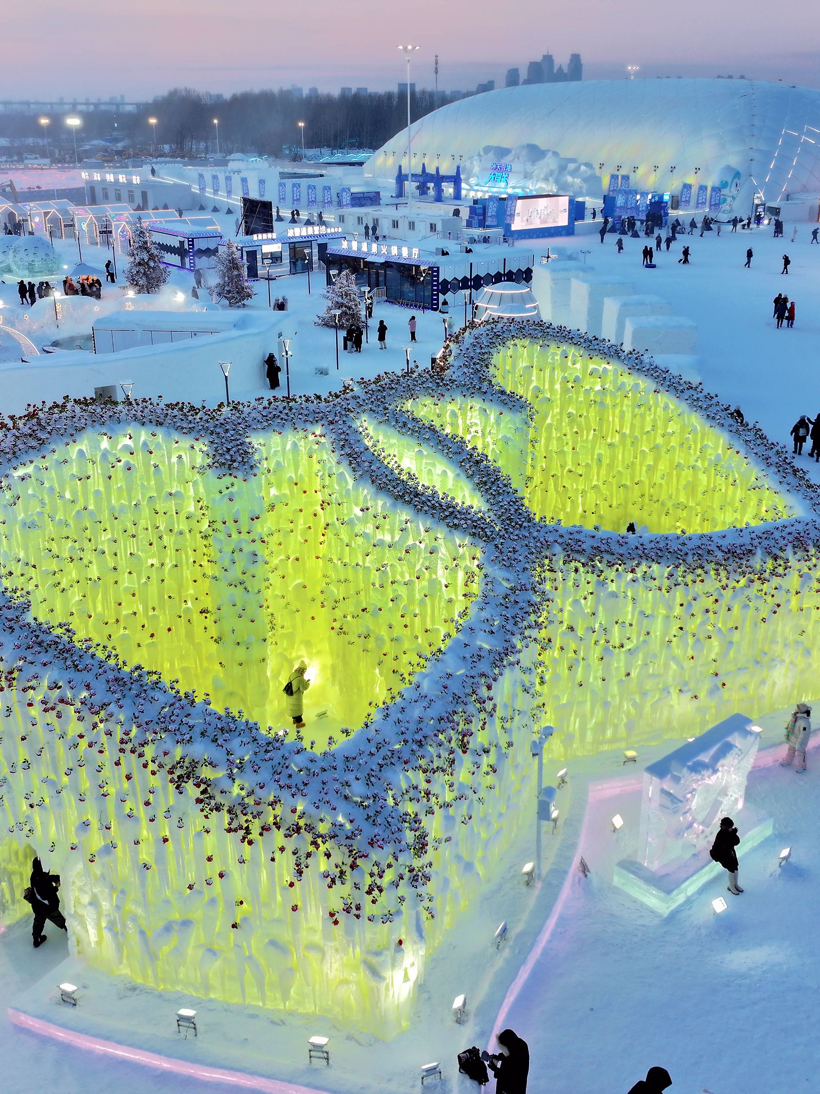 HARBIN, CHINA - JANUARY 02: Aerial view of the icefall adorned with roses and crowned by a heart-shaped ceiling at the 2