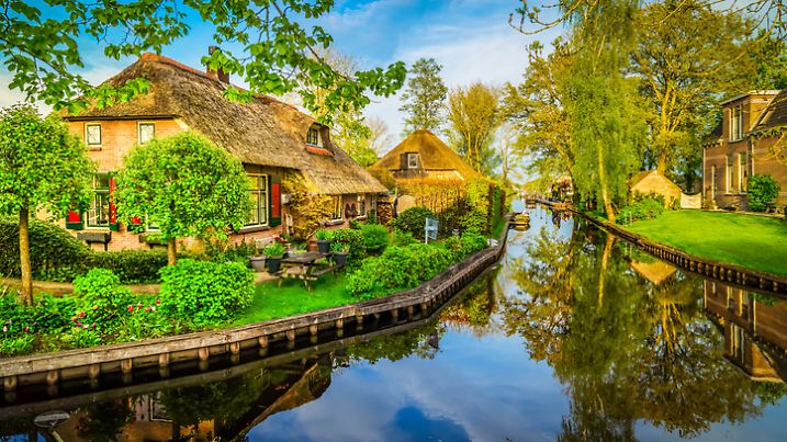 rural dutch traditional country small old town Giethoorn with canals, Netherlands