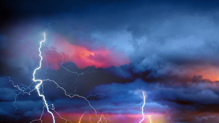 Thunder, lightnings and rain on stormy summer night.