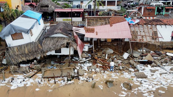 Erick weakens to tropical storm over Mexico, leaves trail of damage