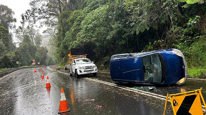 SYDNEY WET WEATHER, A supplied image of emergency services responding to hazardous driving conditions along the Macquari