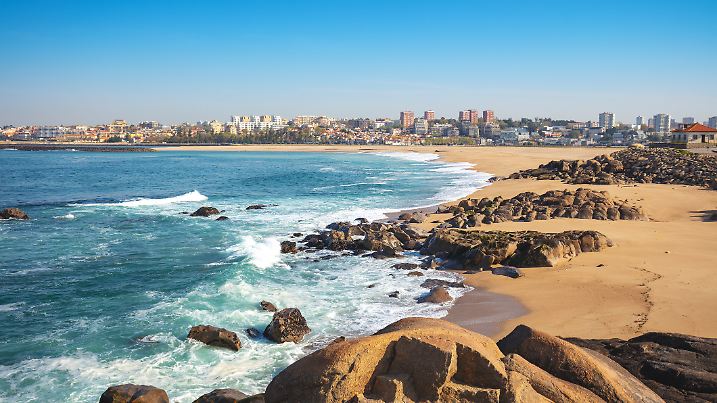 Beautiful bay on a sunny day. Douro Cabedelo Beach. View of Porto city, Portugal, Europe