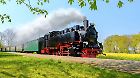Historical German steam train in spring, Rugen, Germany