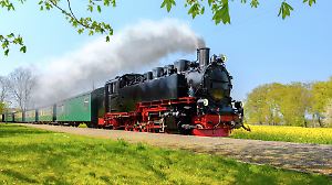 Historical German steam train in spring, Rugen, Germany