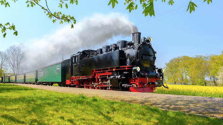 Historical German steam train in spring, Rugen, Germany