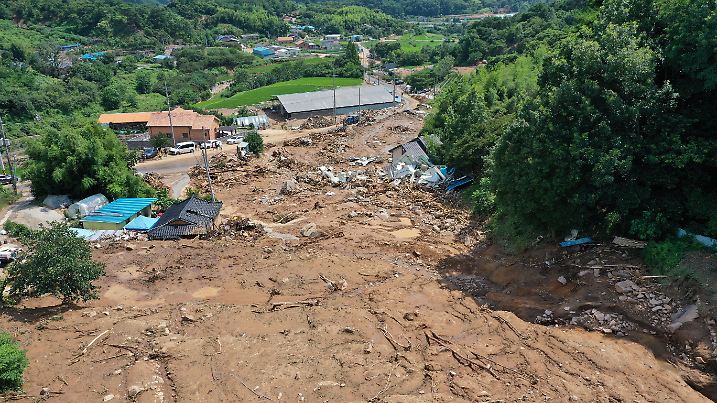 Heavy rain triggers landslide and flooding