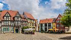 View of the Schlossplatz in Quedlinburg with historic half-timbered houses in summer