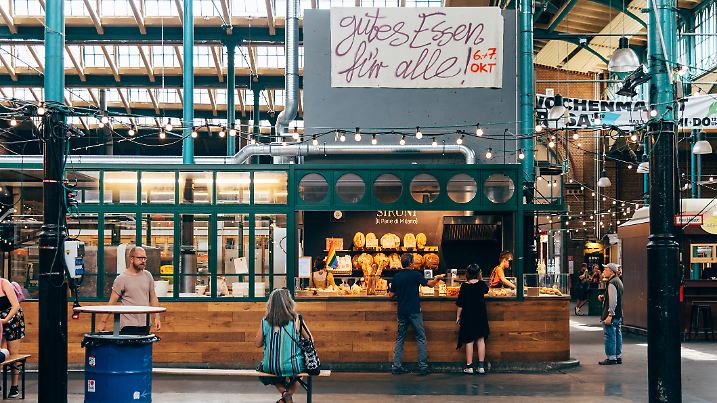 Berlin, Germany - July 29, 2019: Markthalle Neun, Market Hall Nine. It is a historical market with street food in Kreuzberg borough