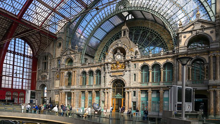Antwerp, Belgium - Apr 12, 2025: Sunlight Illuminated train shed of Antwerpen-Centraal railway station, which is widely regarded as one of the most beautiful train stations in the world.