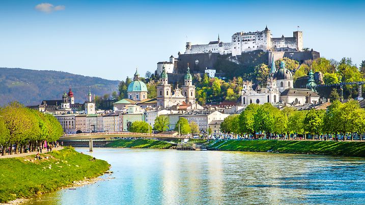 Beautiful view of Salzburg skyline with Festung Hohensalzburg and Salzach river in summer, Salzburg, Salzburger Land, Austria.