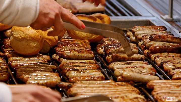 small little sausages on grill