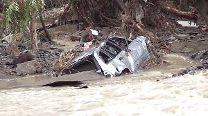 A drone view shows flooded cars in Elenite